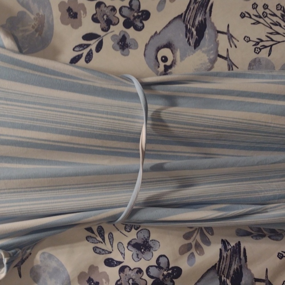 Ladies pastel blue size large dress with small yellow stain on left bottom hym